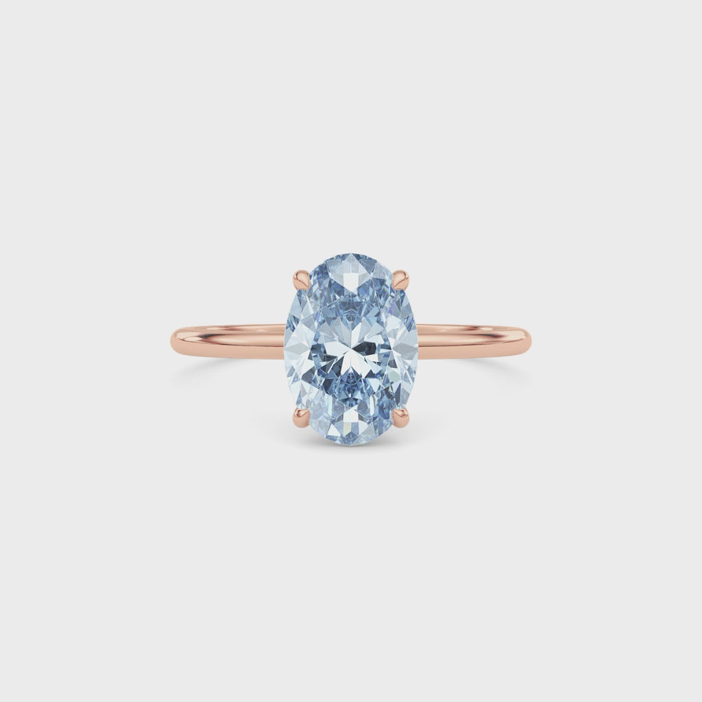 Rose gold Fancy Blue Oval Cut Diamond Hidden Halo Solitaire Engagement Ring with Prong Setting