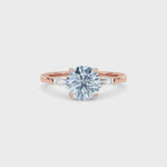 Rose gold Three-Stone Fancy Blue Round Cut Diamond Ring with Tapered Baguette Side Stones