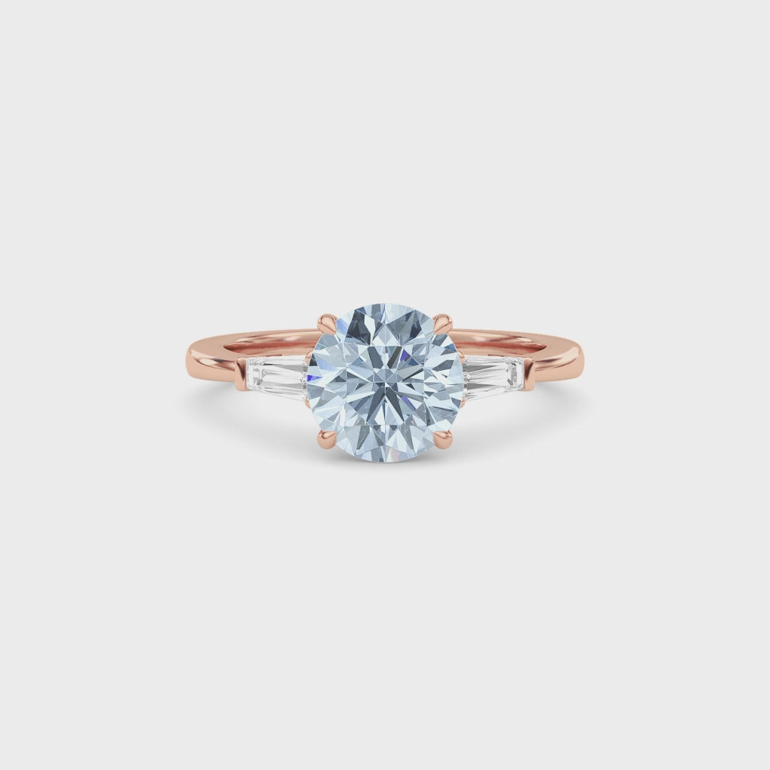 Rose gold Three-Stone Fancy Blue Round Cut Diamond Ring with Tapered Baguette Side Stones