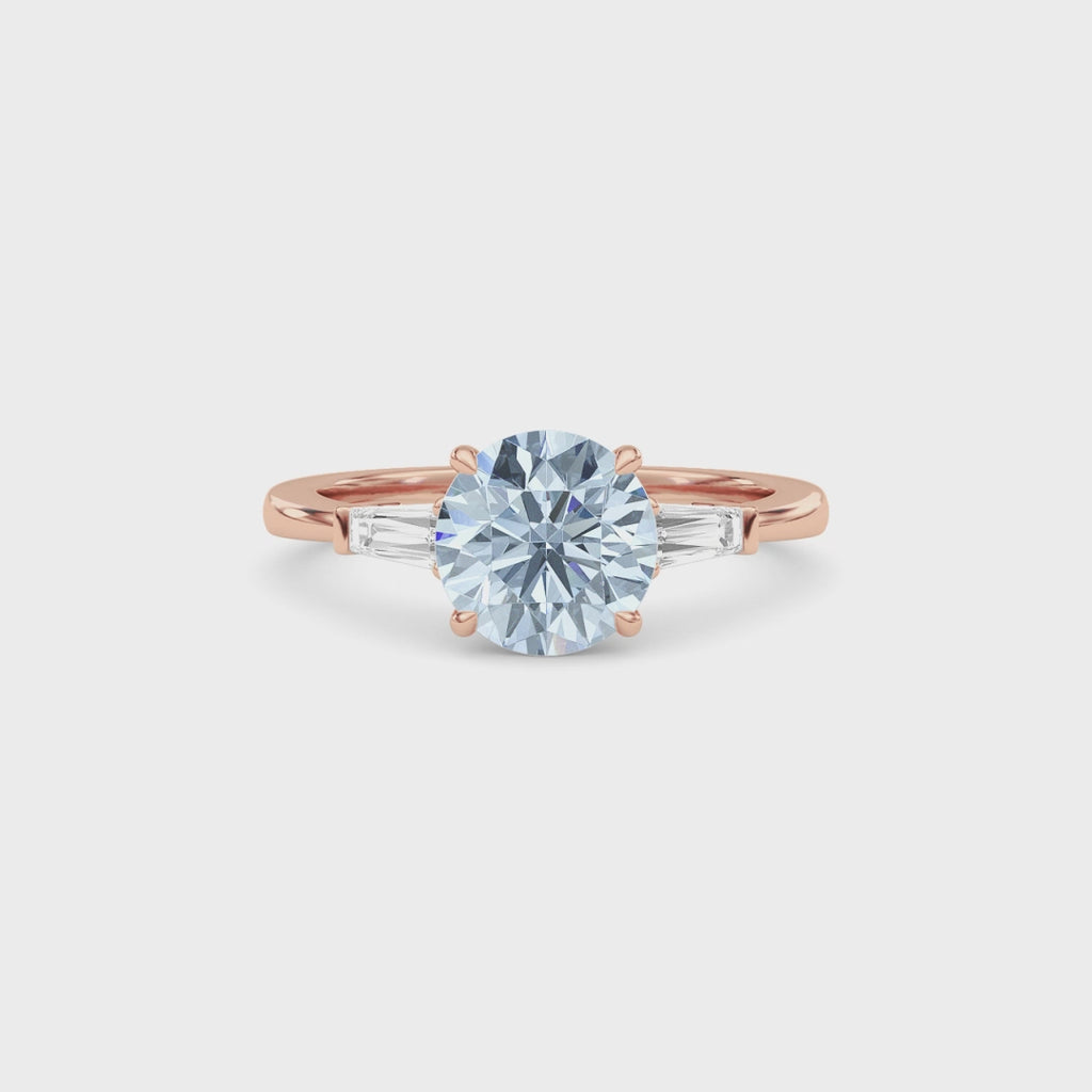 Rose gold Three-Stone Fancy Blue Round Cut Diamond Ring with Tapered Baguette Side Stones
