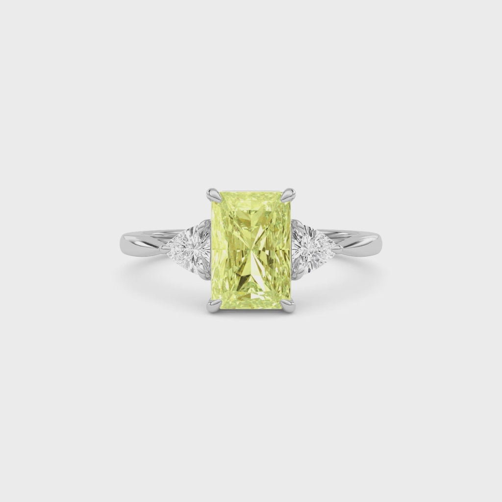 Yellow gold Three-Stone Fancy Yellow Radiant Cut Diamond Ring with Trillion Side Stones