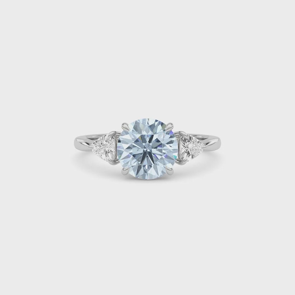 Silver Three-Stone Fancy Blue Round Cut Diamond Ring with Trillion Side Stones