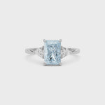 Platinum Three-Stone Fancy Blue Radiant Cut Diamond Ring with Trillion Side Stones