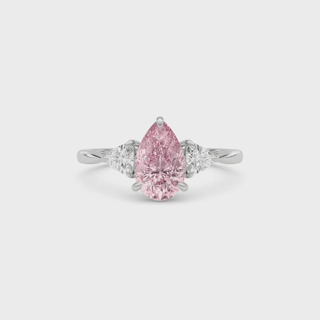 Silver Three-Stone Fancy Pink Pear Cut Diamond Ring with Trillion Side Stones