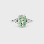 White gold Three-Stone Fancy Green Radiant Cut Diamond Ring with Heart Side Stones