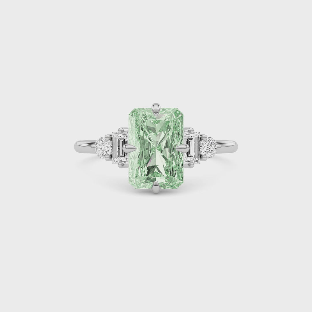 White gold Three-Stone Fancy Green Radiant Cut Diamond Ring with Heart Side Stones