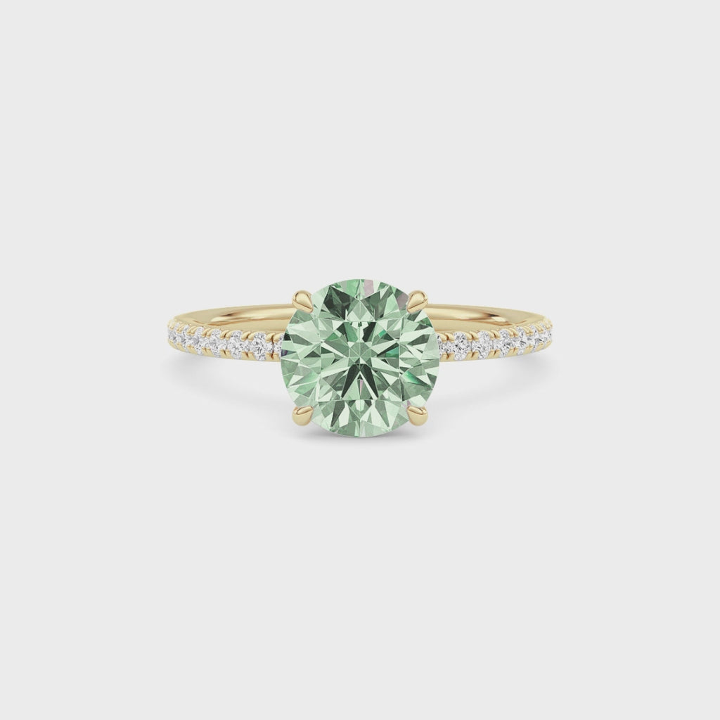 Yellow gold Fancy Green Round Cut Diamond Solitaire with Pavé Band