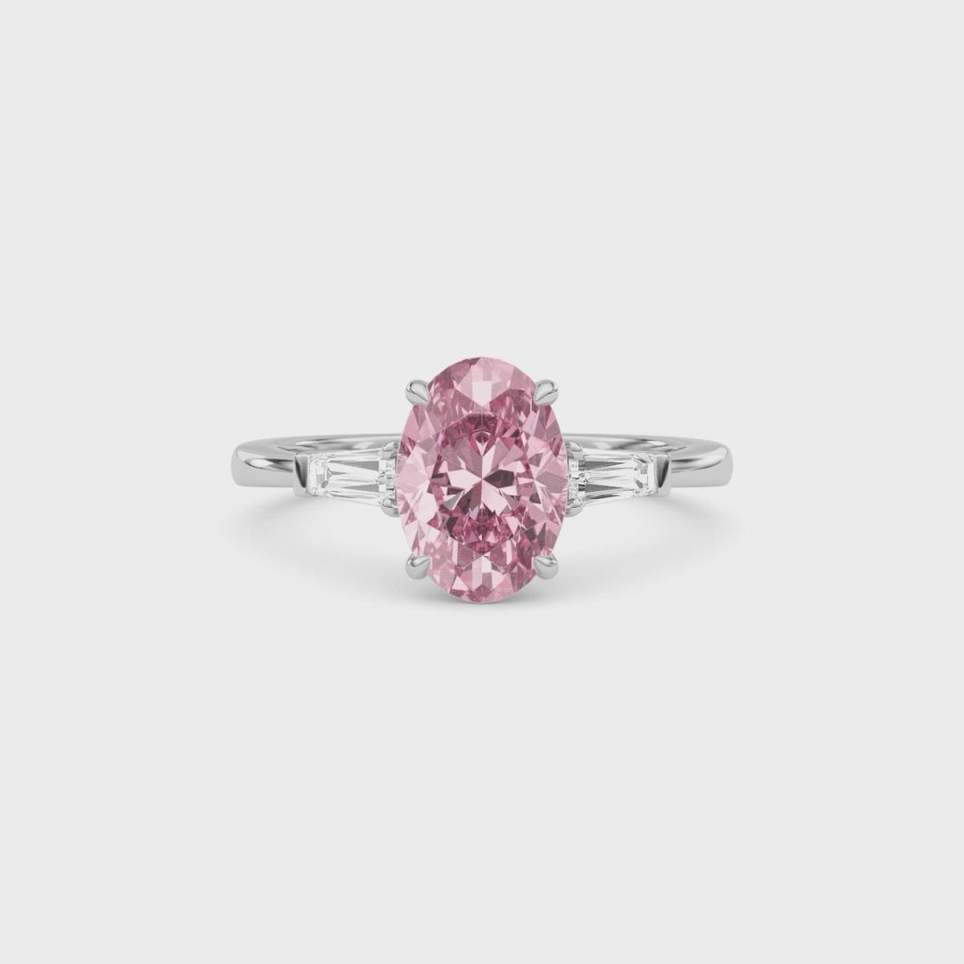 White gold Three-Stone Fancy Pink Oval Cut Diamond Ring with Tapered Baguette Side Stones