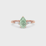 Rose gold Three-Stone Fancy Green Pear Cut Diamond Ring with Tapered Baguette Side Stones