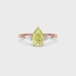 Rose gold Three-Stone Fancy Yellow Pear Cut Diamond Ring with Tapered Baguette Side Stones