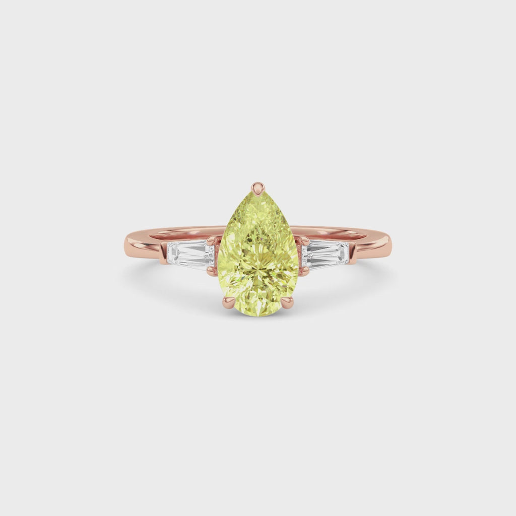 Rose gold Three-Stone Fancy Yellow Pear Cut Diamond Ring with Tapered Baguette Side Stones