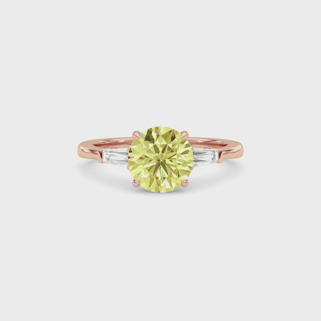 Rose gold Three-Stone Fancy Yellow Round Cut Diamond Ring with Tapered Baguette Side Stones