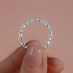 Silver Round and Pear Diamond Eternity Band with Prong Setting
