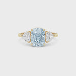 Yellow gold Three-Stone Fancy Blue Cushion Cut Diamond Ring with Heart Side Stones