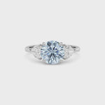 Silver Three-Stone Fancy Blue Round Cut Diamond Ring with Heart Side Stones