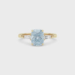 Yellow gold Three-Stone Fancy Blue Cushion Cut Diamond Ring with Tapered Baguette Side Stones