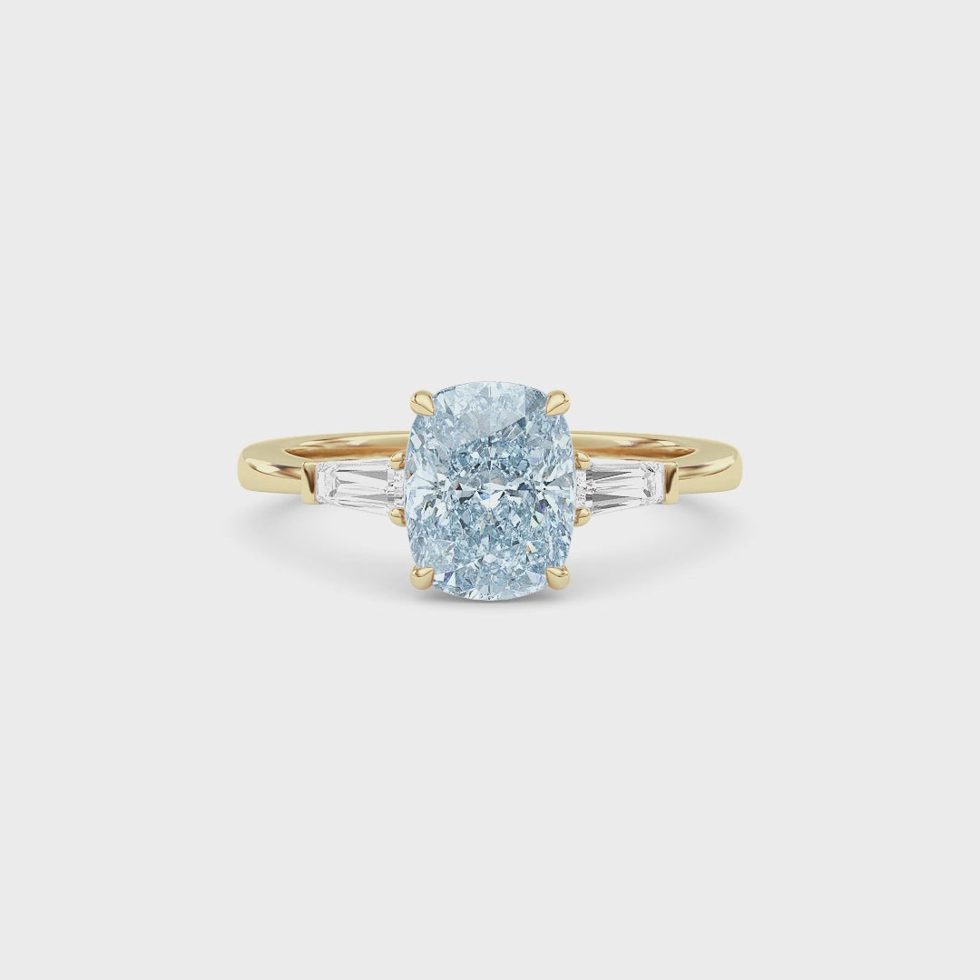 Yellow gold Three-Stone Fancy Blue Cushion Cut Diamond Ring with Tapered Baguette Side Stones