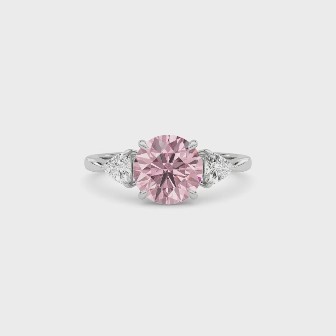 White gold Three-Stone Fancy Pink Round Cut Diamond Ring with Trillion Side Stones
