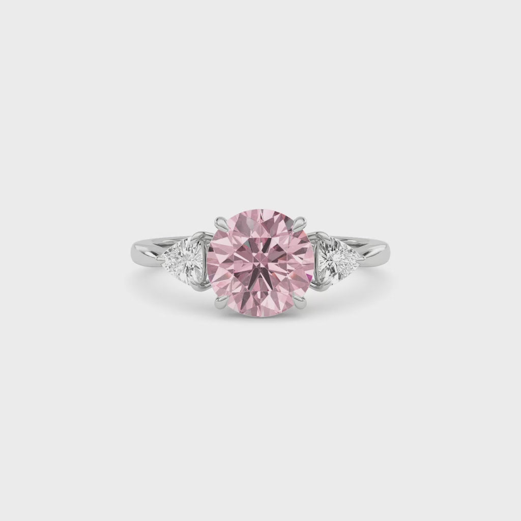 White gold Three-Stone Fancy Pink Round Cut Diamond Ring with Trillion Side Stones