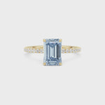 Yellow gold Fancy Blue Emerald Cut Diamond Solitaire with Pavé Band