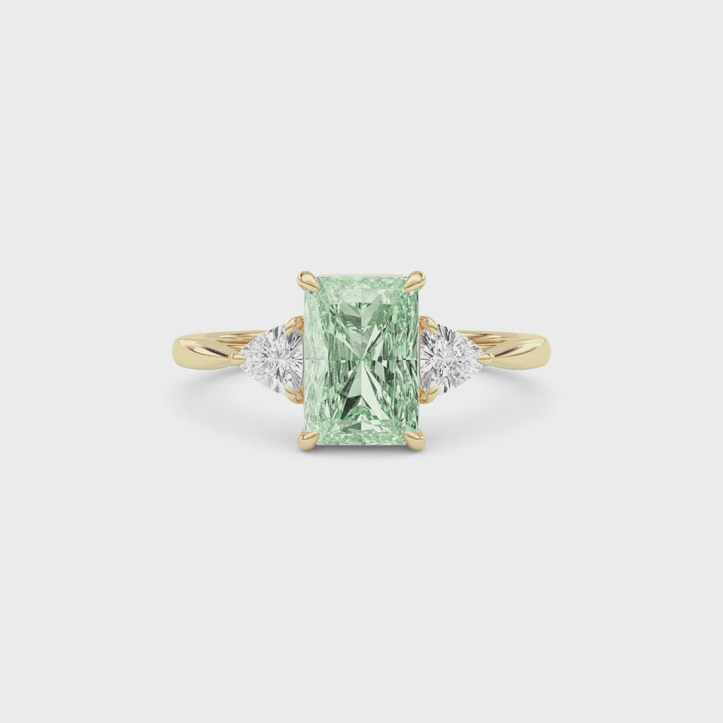 Yellow gold Three-Stone Fancy Green Radiant Cut Diamond Ring with Trillion Side Stones
