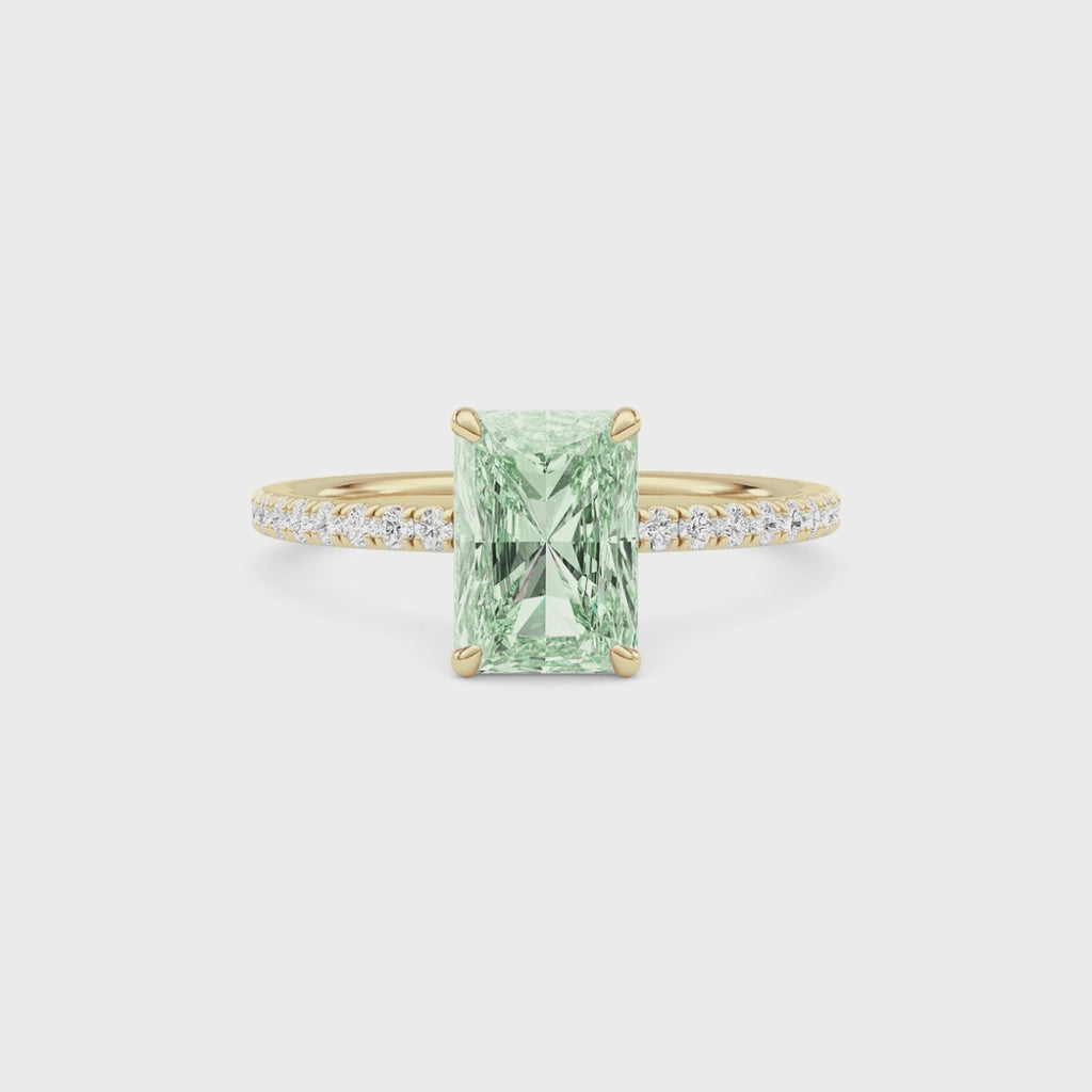 Yellow gold Fancy Green Radiant Cut Diamond Solitaire with Pavé Band