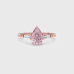Rose gold Three-Stone Fancy Pink Pear Cut Diamond Ring with Tapered Baguette Side Stones