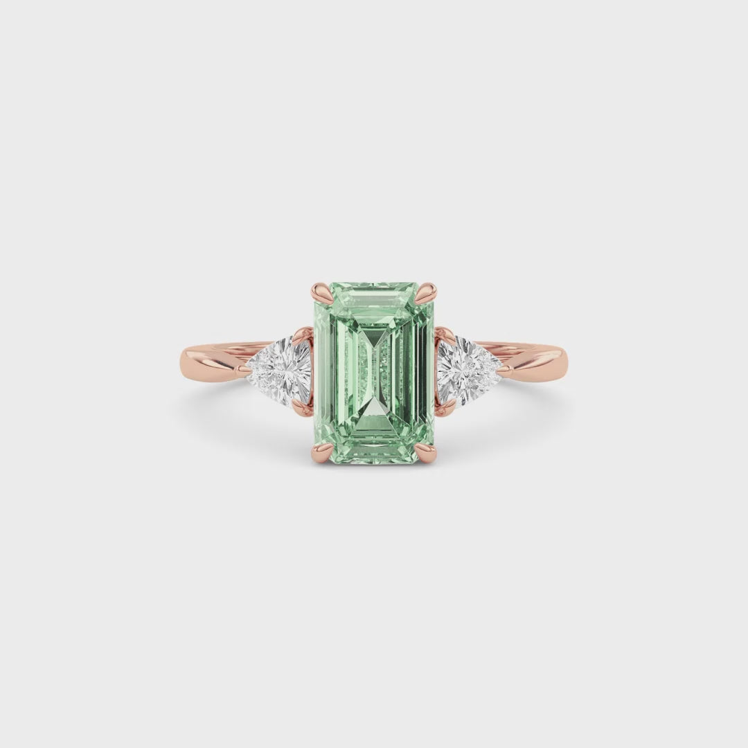 Rose gold Three-Stone Fancy Green Emerald Cut Diamond Ring with Trillion Side Stones