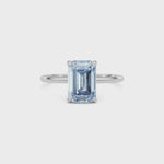 White gold Fancy Blue Emerald Cut Diamond Hidden Halo Solitaire Engagement Ring with Prong Setting