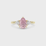 Yellow gold Three-Stone Fancy Pink Pear Cut Diamond Ring with Trillion Side Stones