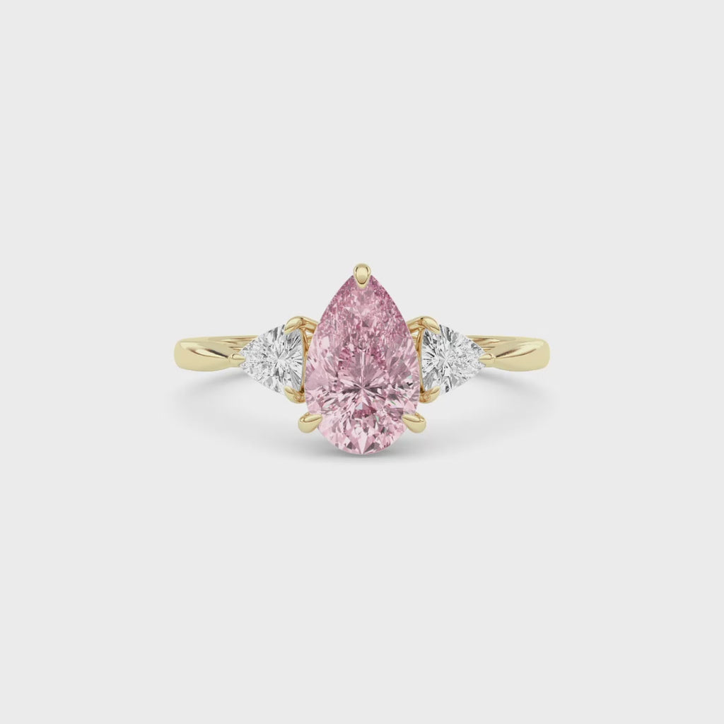 Yellow gold Three-Stone Fancy Pink Pear Cut Diamond Ring with Trillion Side Stones