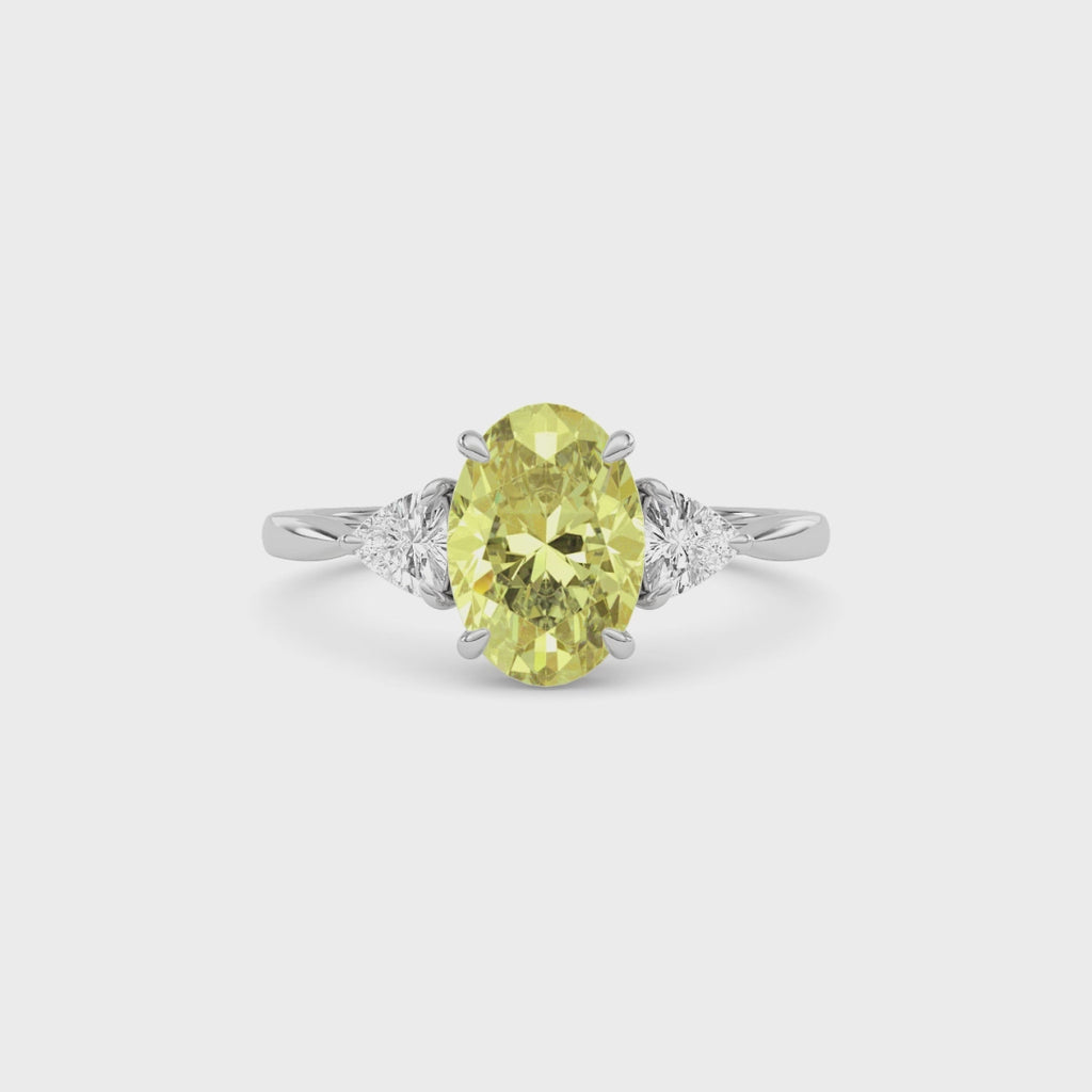 Yellow gold Three-Stone Fancy Yellow Oval Cut Diamond Ring with Trillion Side Stones