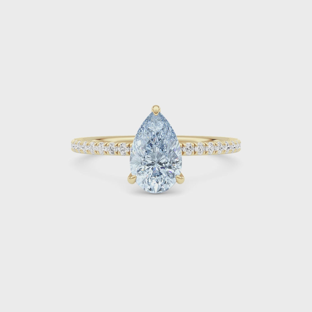 Yellow gold Fancy Blue Pear Cut Diamond Solitaire with Pavé Band