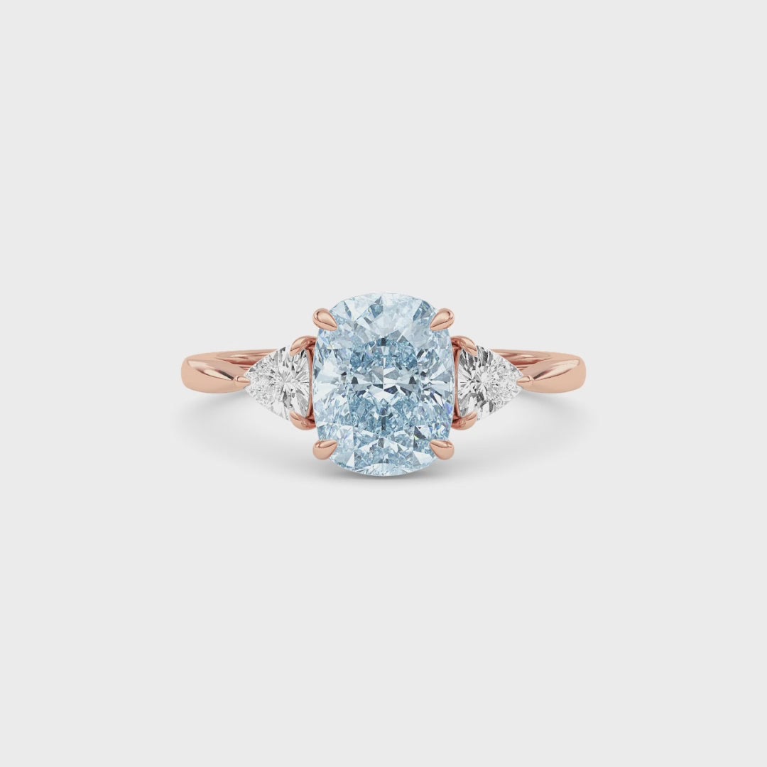 Rose gold Three-Stone Fancy Blue Cushion Cut Diamond Ring with Trillion Side Stones