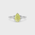 Yellow gold Three-Stone Fancy Yellow Pear Cut Diamond Ring with Trillion Side Stones
