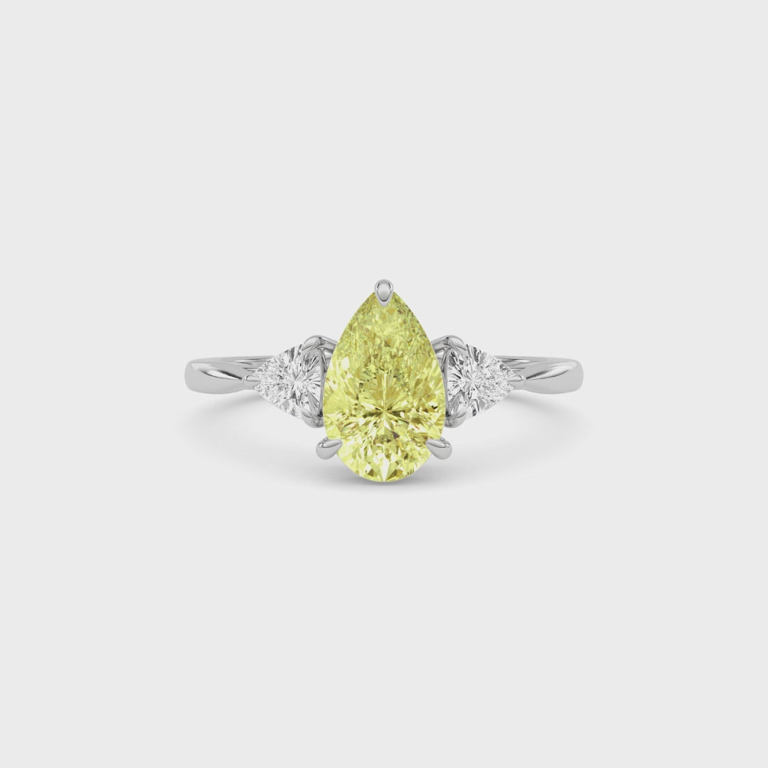 Yellow gold Three-Stone Fancy Yellow Pear Cut Diamond Ring with Trillion Side Stones