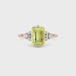 Rose gold Three-Stone Fancy Yellow Emerald Cut Diamond Ring with Heart Side Stones
