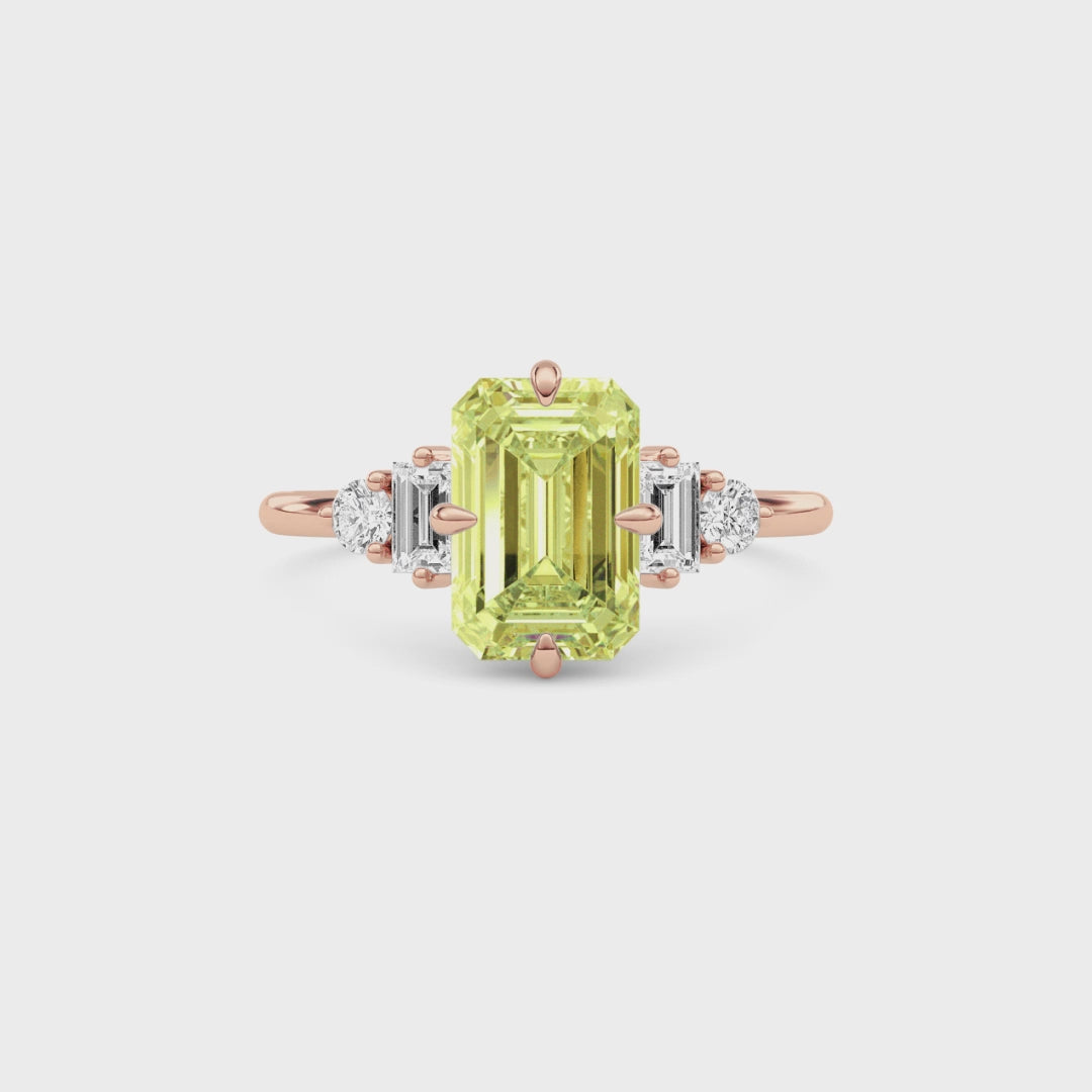 Rose gold Three-Stone Fancy Yellow Emerald Cut Diamond Ring with Heart Side Stones