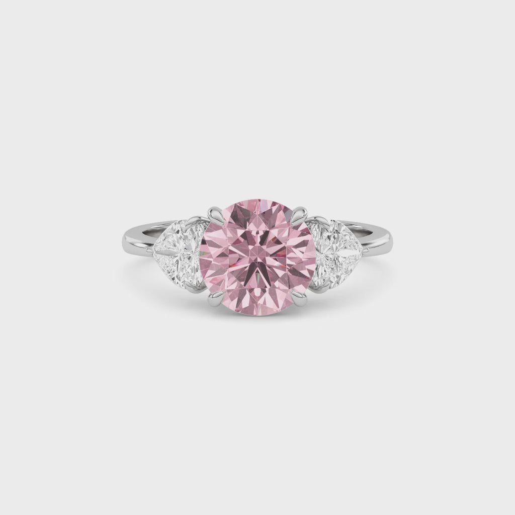 White gold Three-Stone Fancy Pink Round Cut Diamond Ring with Heart Side Stones
