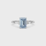 White gold Three-Stone Fancy Blue Emerald Cut Diamond Ring with Tapered Baguette Side Stones