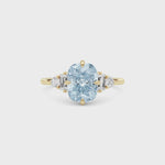 Yellow gold Fancy Blue Cushion Cut Three Stone Diamond Engagement Ring with Tapered Baguette and Round Side Stones