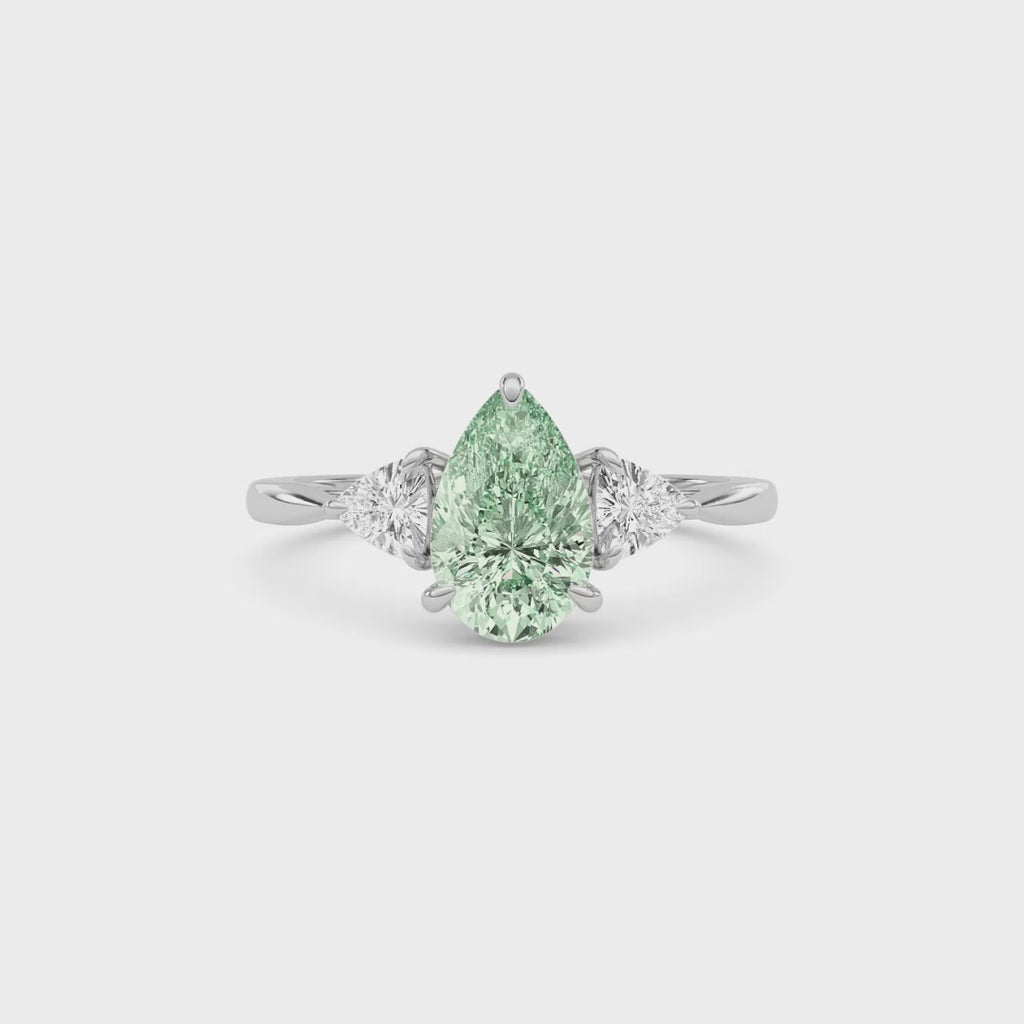 Platinum Three-Stone Fancy Green Pear Cut Diamond Ring with Trillion Side Stones