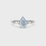White gold Three-Stone Fancy Blue Pear Cut Diamond Ring with Tapered Baguette Side Stones