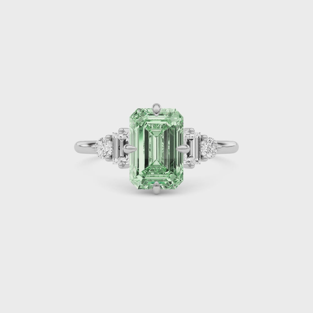Silver Three-Stone Fancy Green Emerald Cut Diamond Ring with Heart Side Stones
