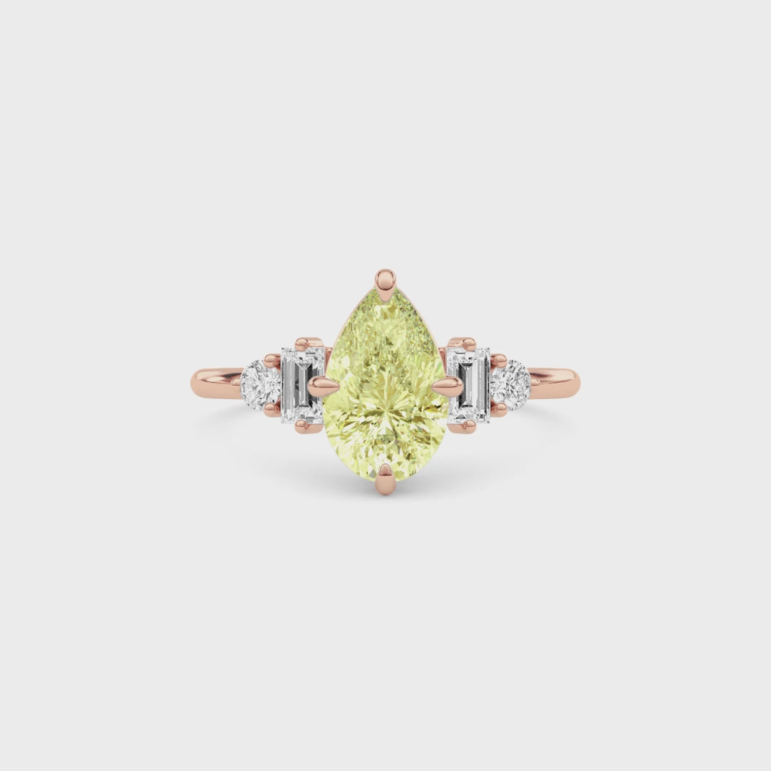 Rose gold Fancy Yellow Pear Cut Three Stone Diamond Engagement Ring with Tapered Baguette and Round Side Stones