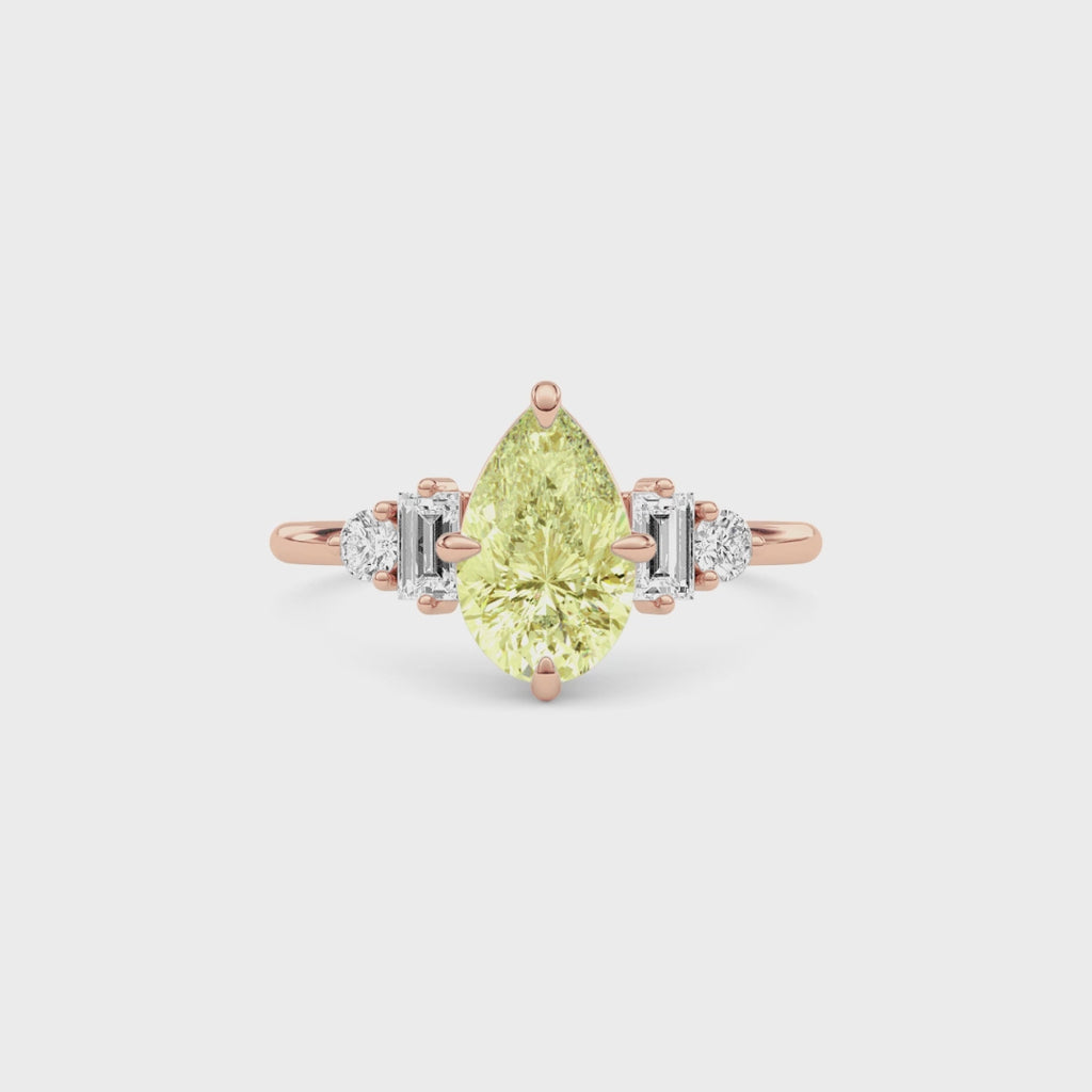 Rose gold Fancy Yellow Pear Cut Three Stone Diamond Engagement Ring with Tapered Baguette and Round Side Stones