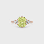 Rose gold Fancy Yellow Cushion Cut Three Stone Diamond Engagement Ring with Tapered Baguette and Round Side Stones