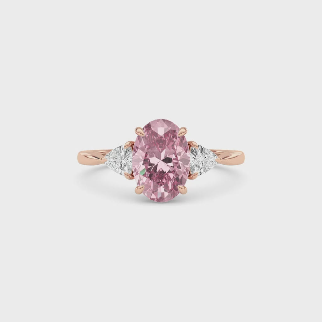 Rose gold Three-Stone Fancy Pink Oval Cut Diamond Ring with Trillion Side Stones