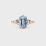 Rose gold Three-Stone Fancy Blue Emerald Cut Diamond Ring with Heart Side Stones