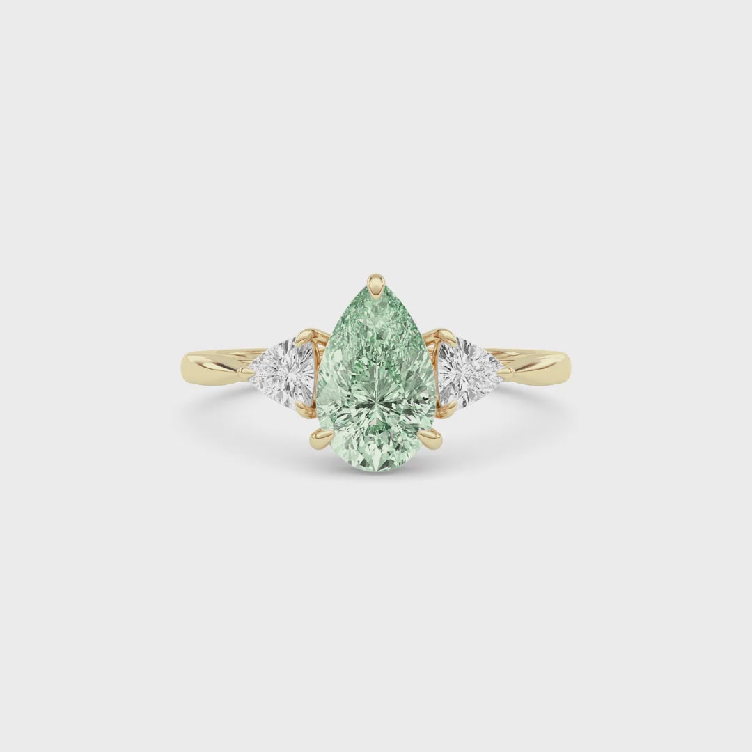 Yellow gold Three-Stone Fancy Green Pear Cut Diamond Ring with Trillion Side Stones